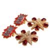 Gold Star-Shaped Sparkling Red Crystals Clip On Earrings