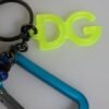 6802625.jpeg Multicolor Tape String DG Logo Keychain Polyester Keyring