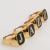 8758961-1.jpeg Gold Tone Brass JAZZ Letter Set 4 Pieces Adjustable Ring