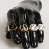 8758976.jpeg Gold Tone Brass JAZZ Letter Set 4 Pieces Adjustable Ring