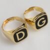 9688867.jpeg Gold-Tone Real Brass Black Enamel "DG" Adjustable Rings
